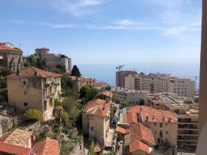 an aerial view of a city with buildings at Citronnier Monaco Sea View in Beausoleil