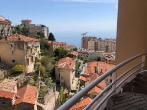 a view of a city from a balcony at Citronnier Monaco Sea View in Beausoleil +5 photos