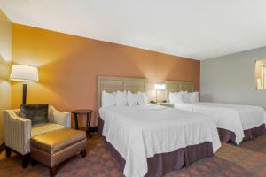 Ένα ή περισσότερα κρεβάτια σε δωμάτιο στο Best Western Pecos Inn +29 φωτογραφίες