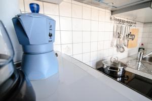 A kitchen or kitchenette at The Rebel's Temple