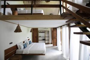 Postel nebo postele na pokoji v ubytování Satya Boutique Resort & Spa + 37 fotografií
