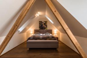 Postel nebo postele na pokoji v ubytování Aparthotel Tycho de Brahe