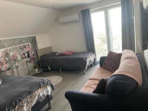 A bed or beds in a room at Maria Vendéghaz