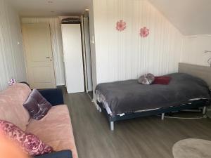 A bed or beds in a room at Maria Vendéghaz