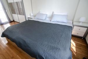 A bed or beds in a room at The Rebel's Temple
