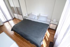A bed or beds in a room at The Rebel's Temple