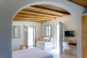 Кровать или кровати в номере Mystic Villas Koufonisi