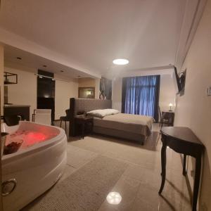Postel nebo postele na pokoji v ubytování Figaro Apartaments