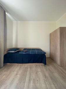 Postel nebo postele na pokoji v ubytování Baltcity