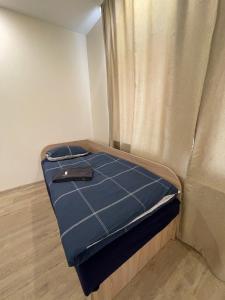 Postel nebo postele na pokoji v ubytování Baltcity