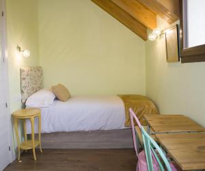 Postel nebo postele na pokoji v ubytování Vente a Babia