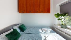 Posteľ alebo postele v izbe v ubytovaní Paulinska 10 Tectum Apartments
