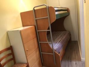 a small room with a bunk bed and a ladder at COMFORTABLE APARTMENT CLOSE TO BUNKERS DEL CARMEL! in Barcelona