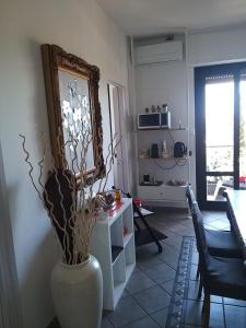 A kitchen or kitchenette at Le stanze di Mina