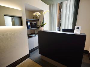 Kuchyňa alebo kuchynka v ubytovaní Quirinale Luxury Rooms
