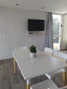 Μια τηλεόραση ή/και κέντρο ψυχαγωγίας στο Apart Hotel La Campiña