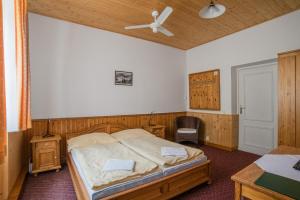 Postel nebo postele na pokoji v ubytování Pension Herman