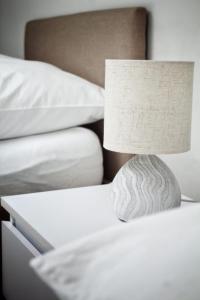 Łóżko lub łóżka w pokoju w obiekcie Apartment Andreja, Opatija city center
