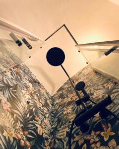 a room with two microphones on the wall at PALAZZO PORCARI in Lecce