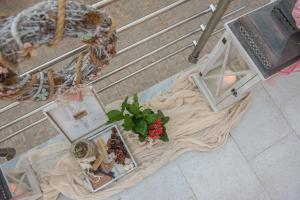 an overhead view of a table with flowers and a vase at Antigoni in Agia Galini