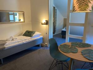 Postel nebo postele na pokoji v ubytování Breidablikk Guesthouse