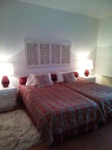 Ένα ή περισσότερα κρεβάτια σε δωμάτιο στο Cozy summer house