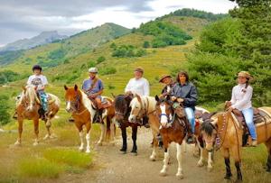a group of people riding horses on a trail at Casa Valentino in Via Liberale Isolabona Sleeps 8 Isolabona Italy in Isolabona