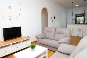 Televízia a/alebo spoločenská miestnosť v ubytovaní Casa La Herradura 2