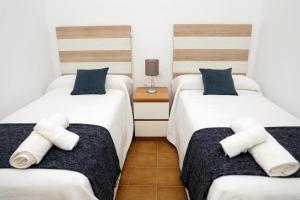 Posteľ alebo postele v izbe v ubytovaní Casa La Herradura 2