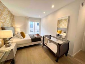 Ein Bett oder Betten in einem Zimmer der Unterkunft Spacious & Quiet apartment by HelloMalaga - AZAHAR
