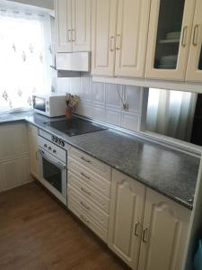 Kuchyň nebo kuchyňský kout v ubytování Agradable casa con jardín: Casasola