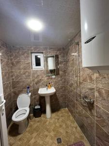 Kylpyhuone majoituspaikassa guest house caucasioni