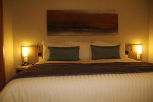 Cama ou camas em um quarto em Quality Hotel Pampulha & Convention Center