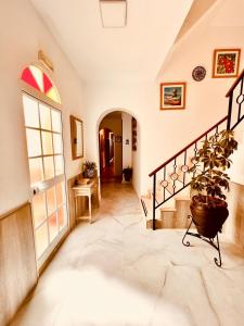 Posteľ alebo postele v izbe v ubytovaní Hostal Muriel