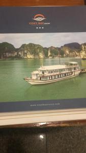 una foto de un barco en el agua en Asia Guest House, en Hanói
