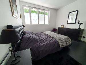 Posteľ alebo postele v izbe v ubytovaní EXIGEHOME-Magnifique Loft à 15 minutes de Paris