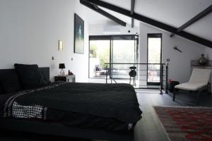 Posteľ alebo postele v izbe v ubytovaní EXIGEHOME-Magnifique Loft à 15 minutes de Paris
