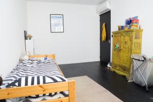 Posteľ alebo postele v izbe v ubytovaní EXIGEHOME-Magnifique Loft à 15 minutes de Paris