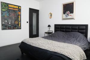 Posteľ alebo postele v izbe v ubytovaní EXIGEHOME-Magnifique Loft à 15 minutes de Paris