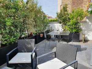 Posedenie v ubytovaní EXIGEHOME-Magnifique Loft à 15 minutes de Paris