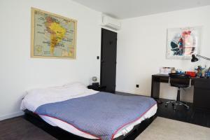 Posteľ alebo postele v izbe v ubytovaní EXIGEHOME-Magnifique Loft à 15 minutes de Paris