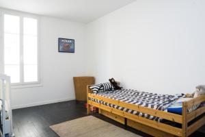 Posteľ alebo postele v izbe v ubytovaní EXIGEHOME-Magnifique Loft à 15 minutes de Paris