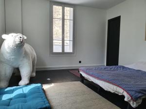Posteľ alebo postele v izbe v ubytovaní EXIGEHOME-Magnifique Loft à 15 minutes de Paris