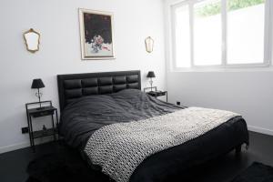 Posteľ alebo postele v izbe v ubytovaní EXIGEHOME-Magnifique Loft à 15 minutes de Paris