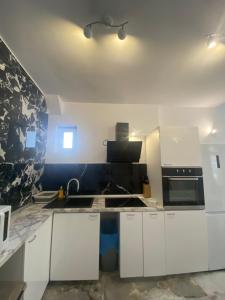 Kuchyň nebo kuchyňský kout v ubytování DUNJA apartment