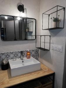 Kúpeľňa v ubytovaní La Maison Du Parc RDC + 10 fotografií