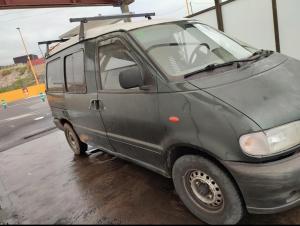 a small gray van parked on the side of the road at Beautiful Campervan to Rent in Santa Cruz de Tenerife