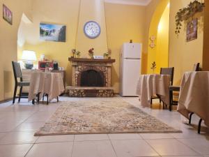 Posezení v ubytování Rose Guest House