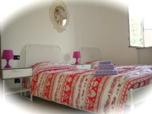 Postel nebo postele na pokoji v ubytování Top Suit Uno - Guest house
