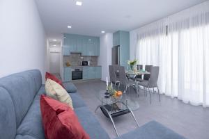 A kitchen or kitchenette at Poris 3 Beachfront Corralejo By Holidays Home